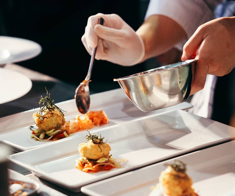 Chef Plating Food Executive chef on-site catering